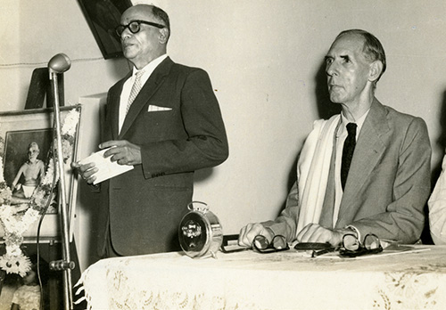 K.K. Nambiar giving a talk at a Sri Ramanasramam function with Arthur Osborne, founder-editor of The Mountain Path, seated to his left